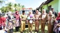 Bupati Mura Serahkan Bantuan Seragam Sekolah dan Mobil Ambulance Desa Kota Baru Semoga Bermanfaat